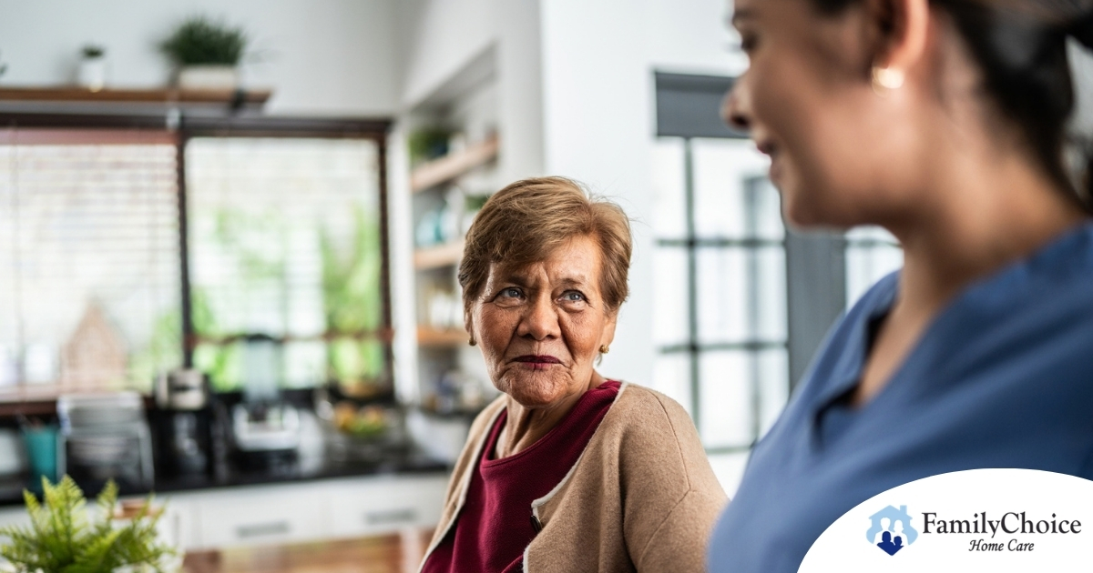 Caregiver provides attentive senior care as part of diabetes awareness